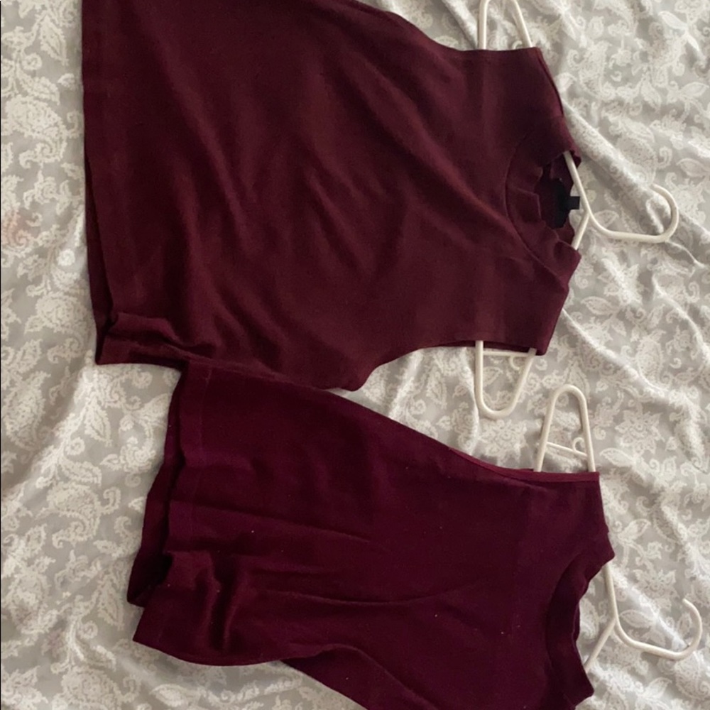 2 maroon shirts.